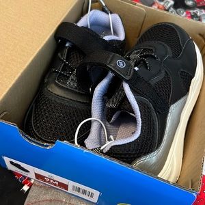 Brand new black sneakers with tags. Size 9 toddler.